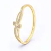 Bangle Luxury CZ Crystal Goldplated Double Heart Design Women Armband Manschett Bangle Wedding Wristband Smycken Drop 231116