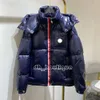 Parkas pour hommes Parker à capuche doudoune pour femmes hommes manteau de marque de luxe pour Badge de poche classique noir