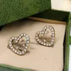 Pendiente de diseñador para mujer Marca de moda Stud Earing Letra Doble G Diamante Perla Pendiente de aro de oro ggity Corazón Mujeres Pendientes de tendencia iuiioyu