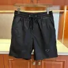 2024 designer mens shorts marca de luxo dos homens curtos esportes verão das mulheres calças de banho curtas roupas