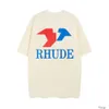 Designermode Kleidung Herren T-Shirts T-Shirt High Street Br Rhude Brief Minimalistischer Druck Kurzarm Paar Sommer Entspanntes, lockeres T-Shirt mit Rundhalsausschnitt