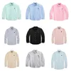 23 مصممي القمصان الصغيرة الجديدة أزياء Polos Mens Womens Long Tees Tops Man Tshirt Cloting Cloting S.eve S.