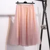 Skirts Net Yarn tiene una falda de gasa casi blanca con la cintura alta de la cintura hada hada larga plisado otoño invierno