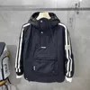 Giacche da uomo Marchi di lusso Uomo con cappuccio Doppia zip Moda coreana Outdoor Tasche per cappotto nero Bomber Felpe