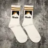 Chaussettes pour hommes Rhude Designer Hommes Femmes Chaussettes de sports de luxe Printemps et été Modèles d'explosion Lettre Impression Chaussettes Coton de haute qualité avec