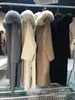 Misturas de lã feminina Coreia com capuz cashmere casaco longo com capuz guarnição de pele real mulheres quentes jaqueta grande feminina outwear primavera solta 231115