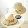 Chapeaux à large bord 1pcs femmes casquettes d'été loisirs chapeau de pêcheur plage protection solaire parasol casquette tissage portable nœud papillon fleur paille