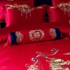 Conjunto de cama Casamento chinês Conjunto de quatro peças Bordado de algodão puro Sala de casamento vermelha brilhante.