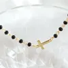 Braccialetti con ciondoli 2023 Squisito braccialetto con croce di perline nere Moda catena color oro Gioielli regalo per feste da uomo e da donna
