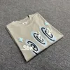 Designer Fashion Abbigliamento Magliette di lusso Tshirt Mercato del pianeta rotto UK Nicchia Lettera di schiuma di schiuma Coppia Stampato T-Shirt a maniche corte