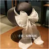 Berretti Cappello da sposa grande in raso nero Classico stile inglese da donna Fedora formali Maglia con fiocco Bowknot Copricapo da cocktail per banchetti