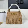 Sac fourre-tout à pompon en cuir suédé mat pour femme, sac de styliste en cuir de veau moyen, sac à bandoulière de luxe, doublure, crochets métalliques, matériel doré, cadenas, 4 couleurs