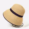 Breda randen hattar Ankomst Lady Sun Hat Kvinnliga resor Stora brimta halm Solskyddsmedel Beach Cap Folded Birthday Present B-7022