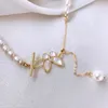 Łańcuchy 2023 Słodki motyl Projekt Naturalny słodkowodna perła 14 -karatowa wypełniona złotymi damami naszyjnik hurtowa biżuteria do kobiet prezent