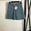 Юбки дизайнер дизайнер вышитая юбка Женская джинсовая джинсовая талия джинсовая лето -дышащая винтаж 5JQQ
