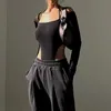 Dames jumpsuits rompertjes Xeemilo sexy off-shoulder riem strakke kleding Italiaanse riem lange mouw tshirt dames slim fit feestkleding strakke kleding 231116