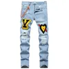 Blå rippade mäns jeans sommar casual hålbyxor för manlig mode slim fit broderi lapptäcke denim byxor pantalones para hombre vaqueros