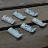 Essstäbchenhalter aus Keramik, kleine Seebrassen-Essstäbchen-Aufbewahrungsablage, japanischer Löffelhalter, kreativer Essstäbchenhalter in Cartoon-Form