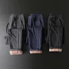 Męskie spodnie zimowe ciepłe polarowe spodni menu bawełniany sznurka elastyczna talia aksamitna działalność na zewnątrz czarne grube spodni Mężczyzna J231116