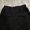 Jeans da uomo Pantaloni sportivi Rhude nero verde albicocca Uomo Donna 1 Pantaloni casual ricamati con asciugamano sciolto Pantaloni multitasche Jogger 231117