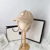 Berretti invernali con protezione per le orecchie Berretto da baseball in lana di agnello di lusso per cappelli firmati da donna per uomo Berretti per cappelli da strada alla moda