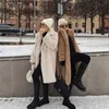 Mulheres de pele sintética de pele de luxo inverno casacos longos mulheres oversized lapela com cinto falso coelho casaco de pele feminino plus size outerwear casacos de pele de pelúcia 231116