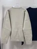 Toteme Suéter de punto con cuello en V de lana para mujer