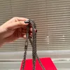 Designer handtas Dames schoudertas Luxe Crossbody tas Boorgesp ontwerp Klassieke okseltas Metalen gesp Kleine vierkante tas Baguette tas portemonnee