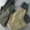 Pantalones para hombres Cargo de verano para hombres Secado rápido Doble usado Cintura elástica Pies desmontables Pantalones largos sueltos rectos impermeables