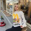 Дизайнерская толстовка с капюшоном для мужчин Модная уличная одежда Cpfm x Mcdonald's Co Br ed Семейное фото Пена с мультяшным принтом Свободный крой Мужской женский плюшевый свитер с круглым вырезом