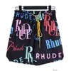 デザイナーショートファッションカジュアルカジュアルビーチショーツRhude23ss夏のニューアメリカンハイストリートファッションBRパーソナライズされたプリントメンズルーズリラックススポーツショーツ