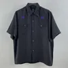 Camisetas de hombre Camisa de alta calidad Hombres Mujeres Albaricoque Agujas Mariposa Bolsillos con botones de gran tamaño Blusa Street AWGE