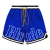 Ny designer herr shorts rhude shorts sommar mode strandbyxor män högkvalitativ gata slitage röd blå svart lila byxor mesh street mode tröjor storlek m 3xl