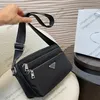 23FW Erkek Kadın Lüks Designer Toates Çantalar Naylon Çanta Çiçekleri Orijinal Donanım Çantası İle Crossbody Çantalar 26cm