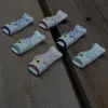 Essstäbchenhalter aus Keramik, kleine Seebrassen-Essstäbchen-Aufbewahrungsablage, japanischer Löffelhalter, kreativer Essstäbchenhalter in Cartoon-Form