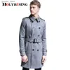 Heren trenchcoats herfst winter nieuwe Britse hertenleer windjack heren dubbele rij knopen Koreaanse jeugd lengte trenchcoat 6XL heren suède windjack Q231118