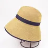 Breda randen hattar Ankomst Lady Sun Hat Kvinnliga resor Stora brimta halm Solskyddsmedel Beach Cap Folded Birthday Present B-7022