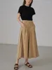 Saias 2023 Cantura alta feminina Salia plissada Primavera e verão Versátil Fashion Ladies Color Solid Long Jupe com bolso
