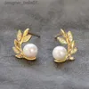 Stud Huitan Style frais feuille conception boucles d'oreilles simulé perle oreille Stud pour femmes couleur or tempérament femelle Piercing bijoux L231117