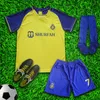 Al Nassr Ronaldo 7 Neues Heimtrikot-Set mit Shorts und Socken für Jungen und Mädchen in Jugendgrößen