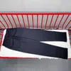 Jeans da uomo Pantaloni sportivi Rhude nero verde albicocca Uomo Donna 1 Pantaloni casual ricamati con asciugamano sciolto Pantaloni multitasche Jogger 231117