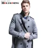 Heren trenchcoats herfst winter nieuwe Britse hertenleer windjack heren dubbele rij knopen Koreaanse jeugd lengte trenchcoat 6XL heren suède windjack Q231118