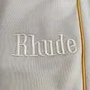 Män s byxor män kvinnor casual guld randig rhude dragstring band klassisk broderi rhude sweatpants gröna aprikosbyxor 231117