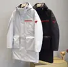 Chaquetas largas de ganso de lujo para hombre, abrigo de Metal con capucha de invierno del Norte, chaqueta cómoda y cálida con etiqueta roja, monler de negocios