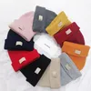 10 färger beanie designer beanie mens kvinnor monterade hattar varma vinter hatt jul hattar varm motorhuv hink hink hatt mössa stickad hatt vårskalle mössor strip hatt