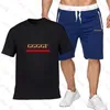 デザイナートラックスーツメン半袖スーツロゴレタープリントTシャツ2ピースセットTシャツとショートパンツスポーツウェアデイリーカジュアルストリートウェアヒップホップスポーツ