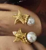 Boucles d'oreilles à tige lumière luxe mode exagérée européenne et américaine en laiton étoile de mer rétro perle oreille Clip