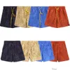 Tasarımcı Kısa Moda Sıradan Giyim Plaj Şortları Rhude Feet Çiçek Bölünmüş Şort Yaz Amerikan High Street Trend Sıradan Gevşek Erkekler Kadın Plaj Pantolonları Ins