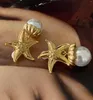Boucles d'oreilles à tige lumière luxe mode exagérée européenne et américaine en laiton étoile de mer rétro perle oreille Clip