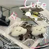 Portachiavi 1PC peluche nuvola bianca portachiavi per le donne bambola di cotone farcito giocattolo portachiavi zaino charms catene per auto amico coppia regalo 231117